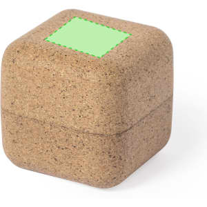 A brown, textured cube-shaped case made from natural materials, featuring a green highlighted area on top.