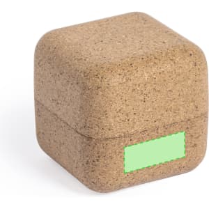 A square, brown cork holder with a smooth texture and a green label area. It has rounded edges.