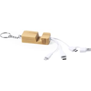 A bamboo multifunction charging cable with USB, Micro USB, and Lightning connectors, attached to a keychain.