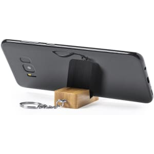 A multifunction charging cable in black, featuring a bamboo stand and keychain attachment for convenience.