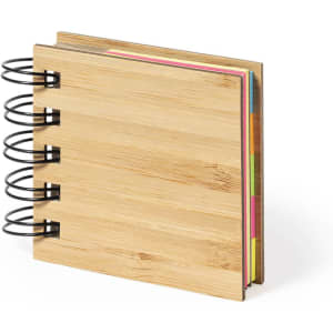 A bamboo sticky notepad with colourful sticky notes and a spiral binding, showcasing natural wood texture.