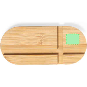 A bamboo phone holder in an oval shape with grooves for stability. It features a green square area.