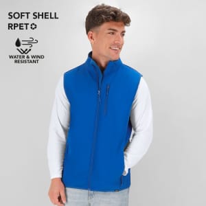 A blue soft shell vest with a zip front and a pocket, featuring a logo. Water and wind resistant.