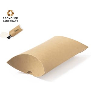 A brown pillow box made from recycled cardboard, featuring a logo on the tag.