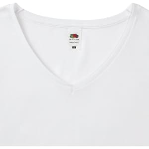 A white V-neck women's T-shirt with a label and a branding logo at the neckline.