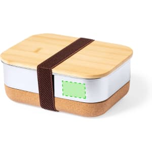 A lunch box with a bamboo lid, stainless steel body, and cork base, secured with a brown strap.