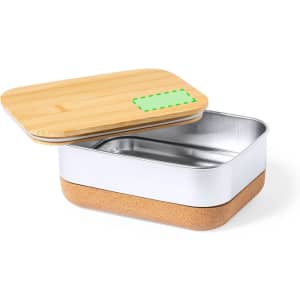 A lunch box with a bamboo lid, metallic interior, and a cork base, featuring a logo on the side.