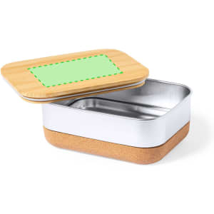 A lunch box with a bamboo lid, featuring a metallic interior and a cork base, ready for food storage.