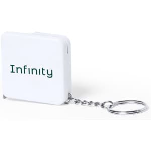 A white tape measure keyring with a chain, featuring a branding logo, compact and square-shaped.