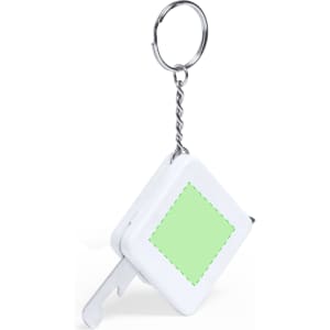 A white tape measure with a green square design, attached to a keyring.