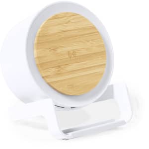 A wireless charger with a white base and a bamboo top, designed for multifunctional use.