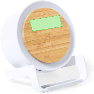 A multifunction lamp with a bamboo top and a white base, designed as a wireless charger.