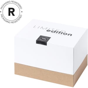 A white and brown box with a minimalistic design, featuring a logo and a seal indicating limited edition.