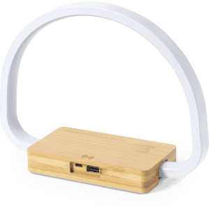 A bamboo wireless charger lamp with a white arch-shaped light, featuring a USB port and charging pad.