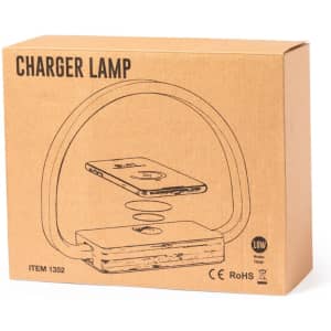 A brown cardboard box featuring an illustration of a wireless charger lamp, with a phone being charged.