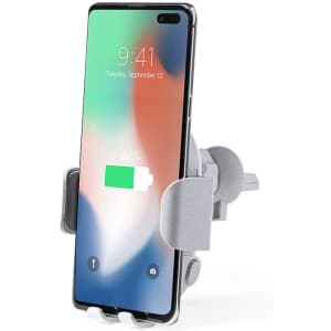 A wireless charger holder in grey, designed to securely hold a smartphone while charging.