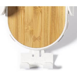 A wireless charger holder in white with a bamboo surface, featuring a branding logo on the base.