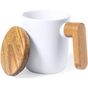A coffee mug in white ceramic with a wooden handle and matching wooden lid. Features a simple, modern design.