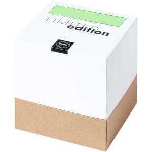 A white gift box with a kraft paper base, featuring a green label and a logo on the lid.