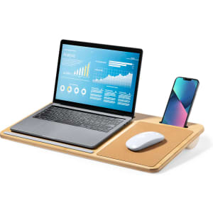 A wooden mousepad in natural colour, featuring a laptop, a white mouse, and a smartphone holder.