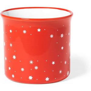A coffee mug in bright red with white star and snowflake patterns, featuring a smooth finish and a simple design.