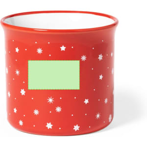 A red coffee mug decorated with white stars and snowflakes, featuring a blank area for customisation.