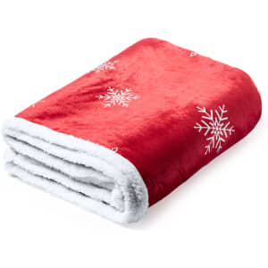 A red blanket with white snowflake designs, featuring a soft, fluffy texture and a contrasting white underside.