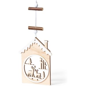 A wooden Christmas decoration shaped like a house, featuring a reindeer and tree design, in natural wood tones.