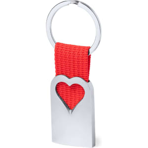A silver keyring with a heart-shaped cutout and a red fabric strap, featuring a circular metal ring.