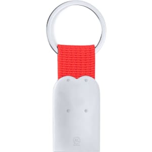 A metallic keyring with a red strap, featuring a smooth surface and a circular attachment.