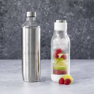 A drink bottle featuring a stainless steel exterior and a clear, infused design with raspberries and lime inside.