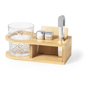A bamboo whisky set featuring a glass, tongs, and two metal coasters. The glass has a diamond pattern design.