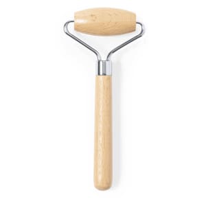 A face massager with a wooden handle and a round rolling end, featuring metal accents.