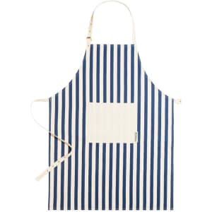 A striped apron in navy blue and white with a front pocket and a logo. Adjustable neck and waist straps are included.
