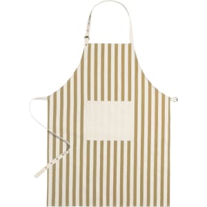 A striped apron in beige and cream with a front pocket and adjustable ties. It features a branding logo.