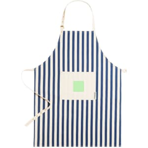 A navy and white striped apron with a front pocket and an adjustable neck strap. It features a logo.