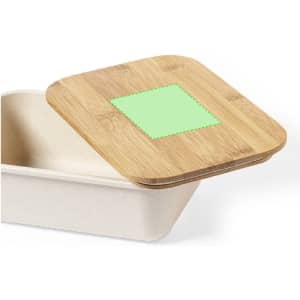 A rectangular container with a natural bamboo lid and a green square on top, made from eco-friendly materials.