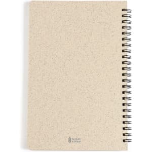 A spiral-bound notebook with a beige cover made from wheat straw, featuring a sleek design and a logo.