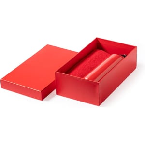 A red drink bottle and matching box, featuring a logo, resting on a white background.