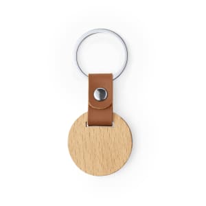 A wooden keyring with a circular wooden tag and a brown leather strap, featuring a metal ring.