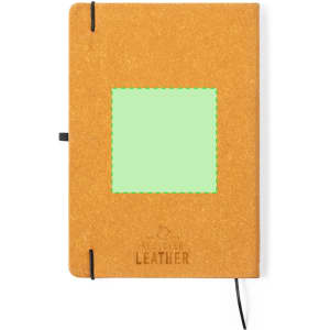 A tan notepad with a stitched green square and black elastic closure. It features a branding logo.