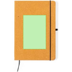 A brown notepad with a green blank space on the front, secured with a black elastic band.