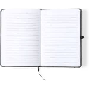 An open grey notepad featuring blank lined pages and a black ribbon marker for organisation.