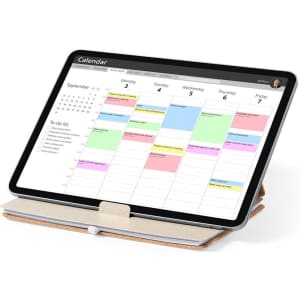 A notebook with a protective cover displaying a colourful calendar layout and to-do list across various days.