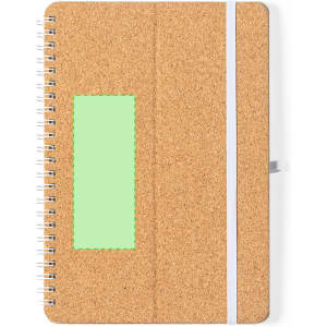 A cork-covered notebook with a green accent, featuring a spiral binding and an elastic closure.