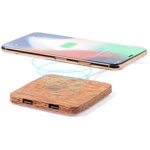 A wooden wireless charger with a smartphone hovering above it, depicted with charging graphics.