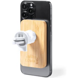 A bamboo wireless charger holder attached to a black smartphone, featuring a white charging connector.