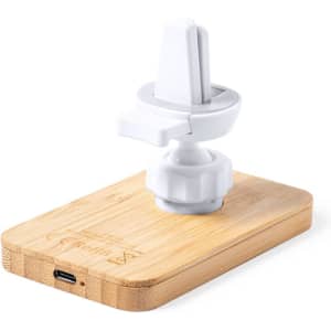A wireless charger holder featuring a white phone mount on a bamboo base, with a USB port at the back.