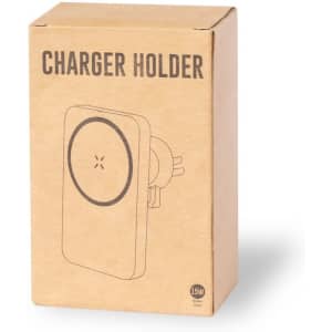 A brown cardboard box containing a wireless charger holder with an embossed circular design and a plug attachment.