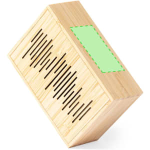 A wooden speaker with a slotted design, featuring a light green area, angled for display.